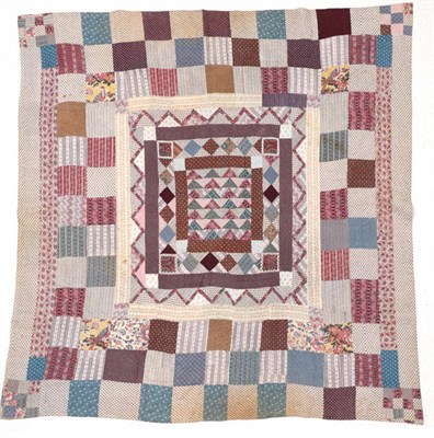 Lot 2053 - Circa 1810-1830 Printed Cotton Patchwork Quilt, comprising multi frames with central panel of...