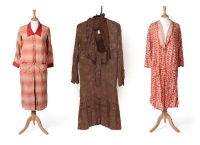 Lot 2129 - Three 1920s Day Dresses, comprising a Suvesco Foreign red and cream spotted wrap dress; a brown...