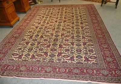 Lot 1408 - Anatolian Carpet West Turkey The cream field with an ivory allover lattice containing leaves...