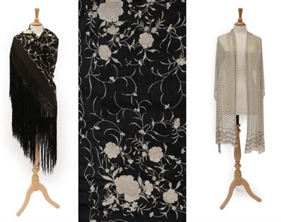 Lot 2204 - Early 20th Century Black Silk Shawl, embroidered with cream flower heads overall, within a...