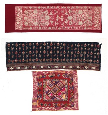 Lot 2235 - A 19th Century Indian/Eastern Cut Panel, worked on black cotton and embroidered in red, white,...