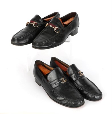 Lot 2256 - Two Pairs of Gucci Gentlemen's Black Leather Loafers, one pair with two-tone metal interlocking...