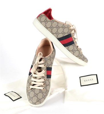 Lot 2261 - Pair of Gucci 'Ace GG Supreme' Trainers/Sneakers, the grey canvas printed with GG monogram,...