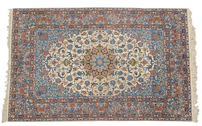 Lot 1418 - Part Silk Isfahan Rug Central Persia The ivory field of palmettes and scrolling leafy vines...