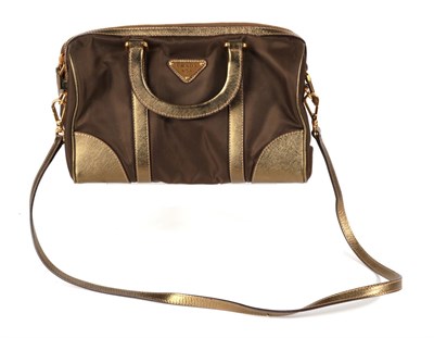 Lot 2299 - Prada Bronze Handbag/Shoulder Bag, the canvas in burnt bronze with gold bronze leather trim,...