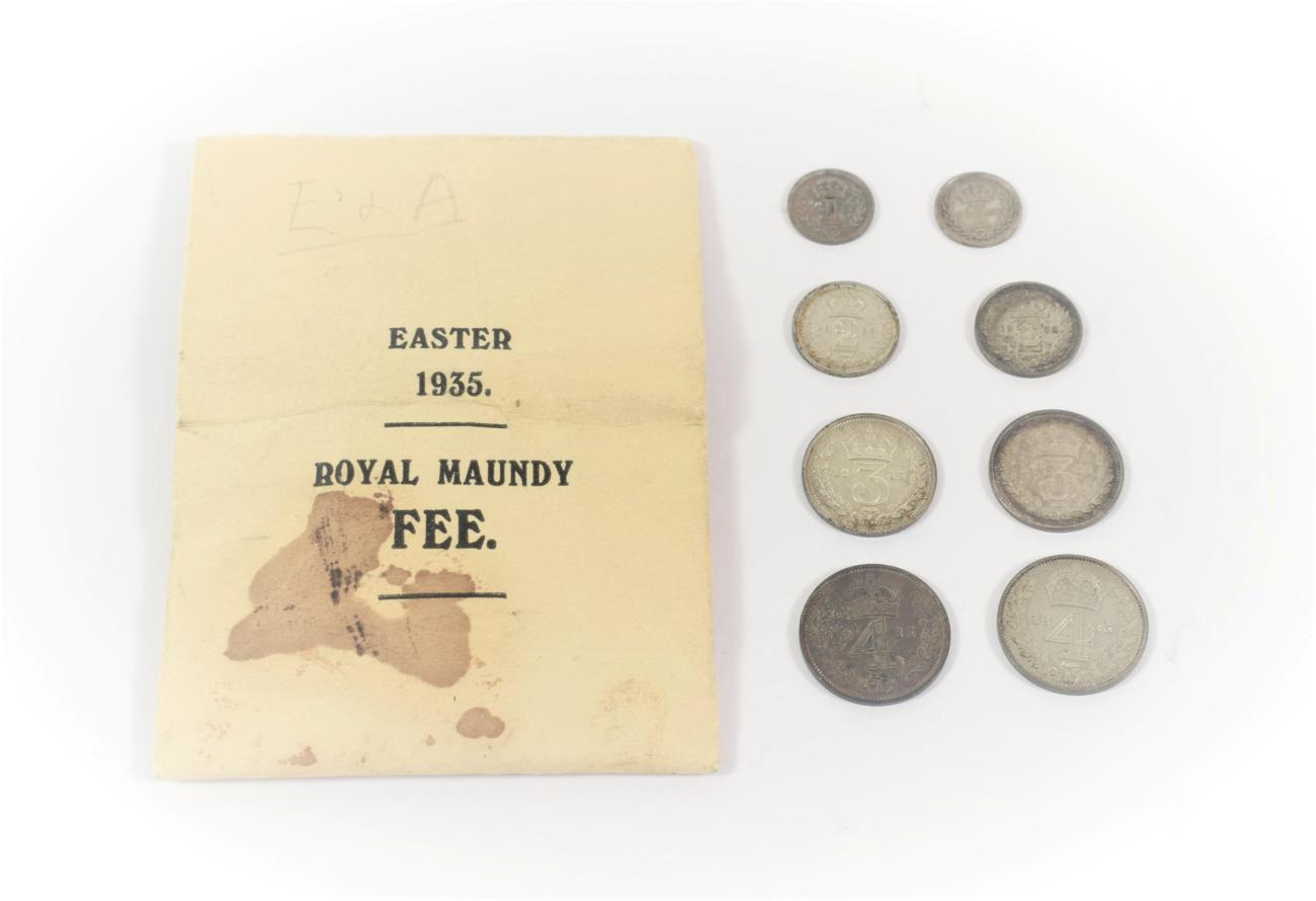 Lot 24 - George V (1910-1936), Maundy Money, 1935, two complete sets with original 'Easter 1935'...