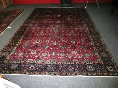 Lot 1424 - Tabriz Carpet Persian Azerbaijan The raspberry field with an allover design of palmettes and...