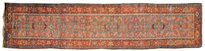 Lot 1437 - North West Persian Runner The indigo Herati field enclosed by madder borders of samovar devices...