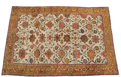 Lot 1448 - Ziegler Mahal Carpet West Persia The ivory field with an allover design of large flowerheads...