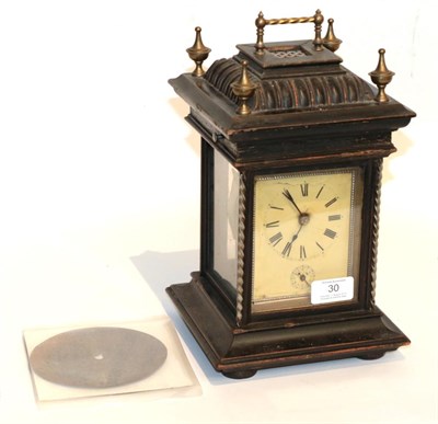 Lot 30 - A musical alarm mantel timepiece, with three symphonium discs