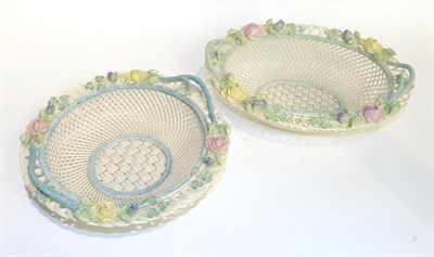Lot 35 - A Belleek flower encrusted basket and another similar (2)