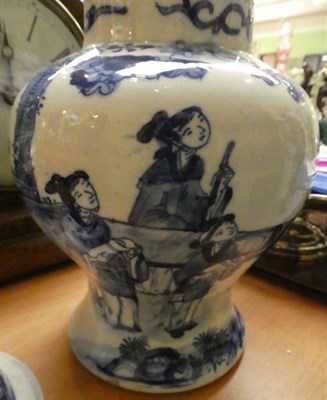 Lot 38 - A 19th century Chinese blue and white figural vase and cover