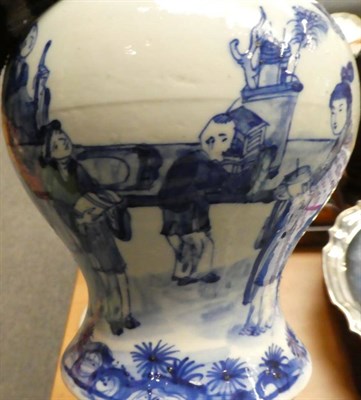 Lot 38 - A 19th century Chinese blue and white figural vase and cover
