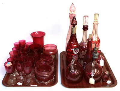 Lot 43 - Two trays of 19th century ruby and cranberry glass including decanters, wines, vases etc