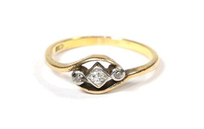 Lot 57 - A diamond three stone ring, three round brilliant cut diamonds in white rubbed over settings,...