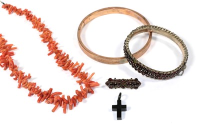 Lot 73 - A jet cross; a 9 carat gold bangle (a.f.); a coral branch necklace; a heart shaped turquoise...