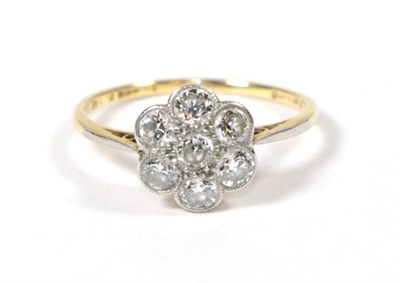 Lot 84 - A diamond cluster ring, finger size L