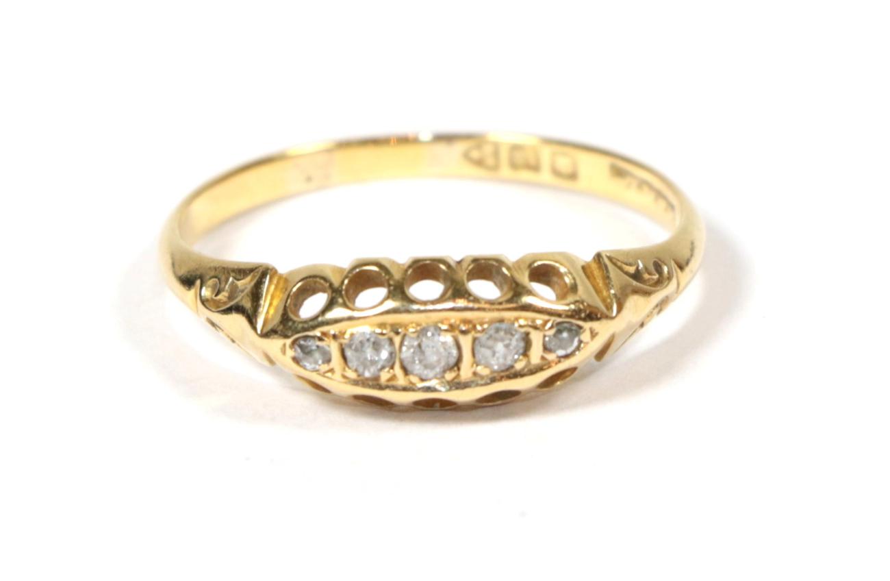Lot 86 - An 18 carat gold diamond five stone ring, finger size P