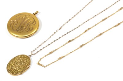 Lot 105 - A round locket with engraved initials; a locket stamped '9CT' on a chain with clasp stamped...