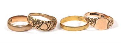 Lot 115 - A 22 carat gold band ring, out of shape; a 9 carat gold band ring, finger size J; a 9 carat...