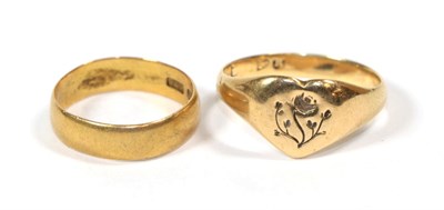 Lot 118 - A 22 carat gold band ring, finger size K1/2; and a signet ring, marks rubbed, finger size S1/2 (2)