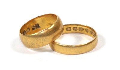 Lot 121 - Two 22 carat gold band rings, G1/2 and M1/2 (2)