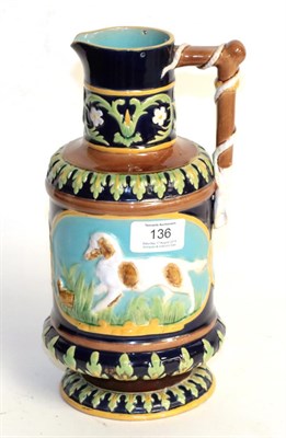 Lot 136 - A 19th century George Jones Majolica hunting jug with stylised whip-form handle and decorated...