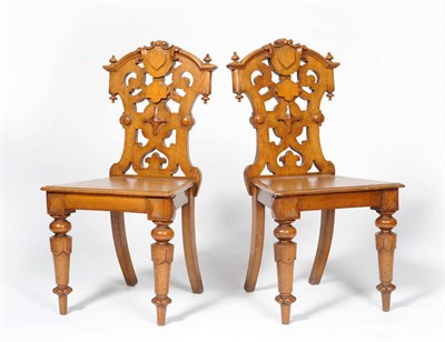 Lot 1460 - A Pair of Victorian Carved Oak Hall Chairs, in the manner of G Smith, mid 19th century, the pierced