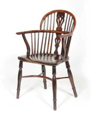 Lot 1461 - A 19th Century Thames Valley Yew and Elm Windsor Chair, the low double bow back with pierced...