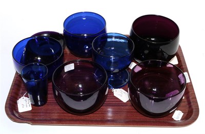 Lot 158 - A tray of early to mid 19th century blue and amethyst glass, mostly rinsers