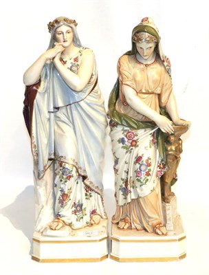Lot 163 - A pair of 19th century Continental porcelain figures of classical maidens, Iphigenia and Kassandra