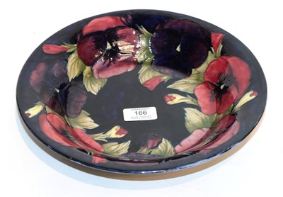Lot 166 - A William Moorcroft pansy bowl, on a blue ground