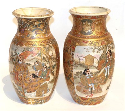 Lot 169 - A near pair of Meji period Japanese satsuma vases, panels decorated with daimyo and warriors,...