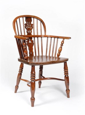 Lot 1464 - A 19th Century Yewwood and Elm Windsor Chair, the low double bow back with pierced splat and...