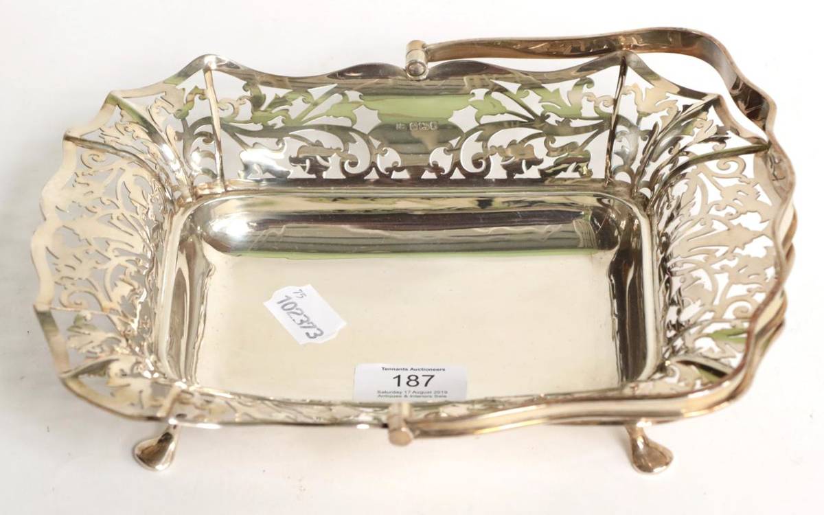 Lot 187 - An Edward VII silver basket, by John and William Deakin, Sheffield, 1903, oblong and with pad feet