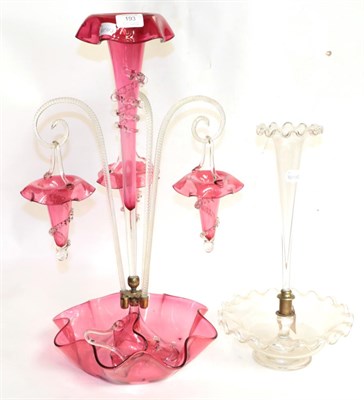 Lot 193 - A Victorian cranberry glass epergne (one cane lacking), together with a clear glass single stem...