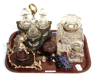 Lot 194 - A brass and ebonised wood three piece condiment stand, two glass inkwells, two cut glass scent...