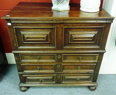 Lot 1466 - A Joined Oak Chest in Two Parts, late 17th century, the upper section with a hinged lid above...