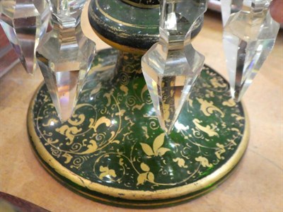 Lot 199 - A pair of floral and gilt decorated 19th century green glass table lustres