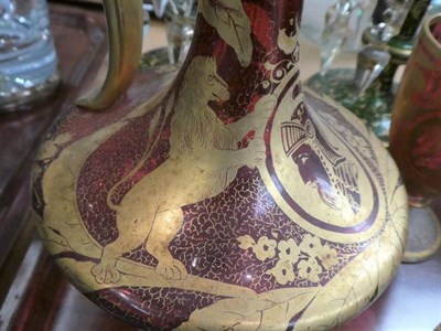 Lot 200 - A 19th century Bohemian three piece gilt highlighted cranberry glass wine set comprising a ewer and