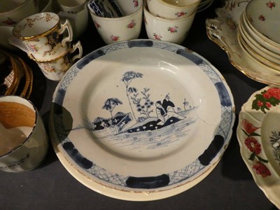 Lot 235 - An 18th century Chinese porcelain tea bowl; a 19th century Delft plate; two Victorian name...