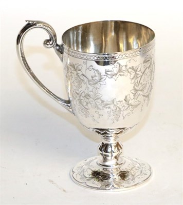Lot 243 - A Victorian silver mug, maker's mark WWH, Sheffield, 1865, the bowl tapering and on spreading foot