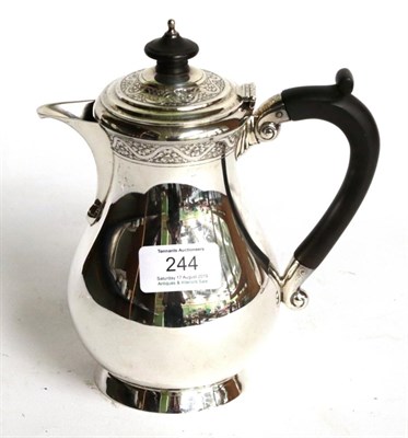 Lot 244 - A George V silver hot-water jug, by Wakely and Wheeler, London, 1922, baluster and on collet...