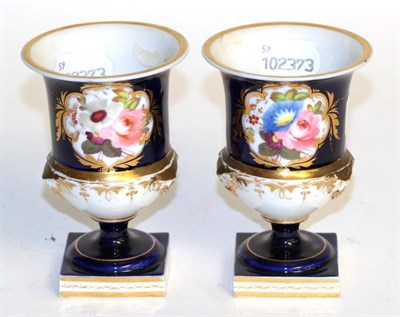 Lot 246 - A pair of Chamberlains Worcester floral painted urns