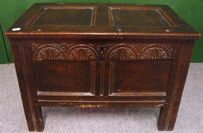 Lot 1471 - A Joined Oak Small Chest, the hinged lid with two fielded panels enclosing a lidded till, the...