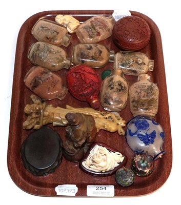 Lot 254 - Cinnabar lacquer and glass scent bottles, early 20th century ivory netsuke and other Oriental items