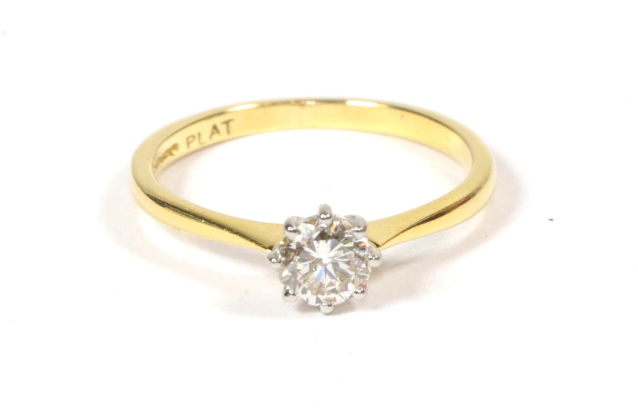 Lot 270 - An 18 carat gold solitaire diamond ring, a round brilliant cut diamond in a claw setting, to...