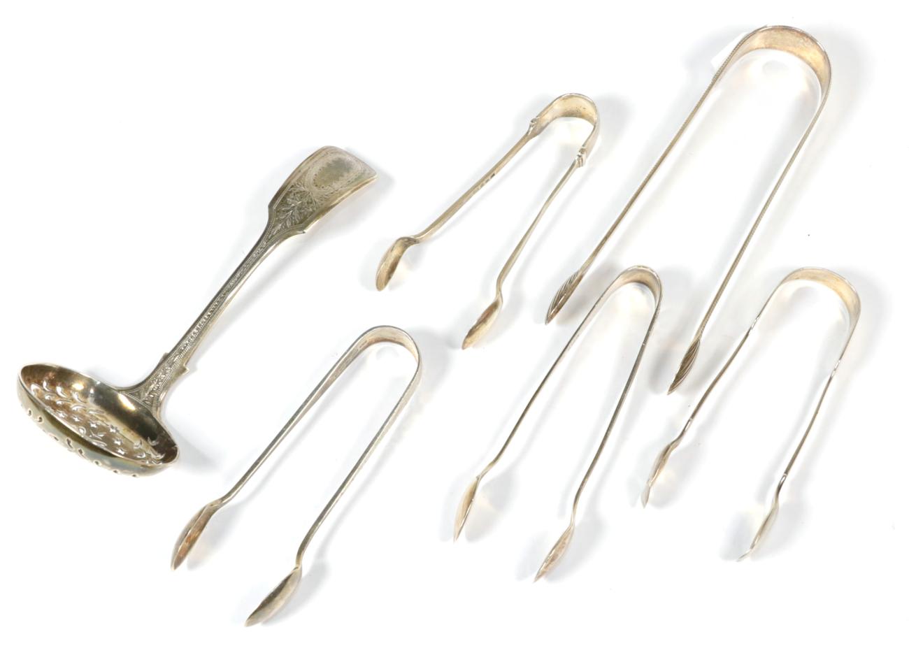 Lot 278 - Five pairs of silver sugar tongs, including: a pair with beaded border, London, 1799, a Fiddle...