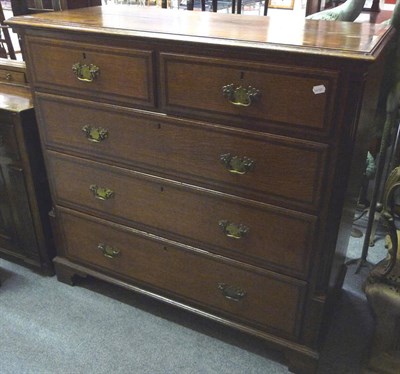 Lot 1474 - A George III Oak and Mahogany Crossbanded Straight Front Chest of Drawers, circa 1800, the...