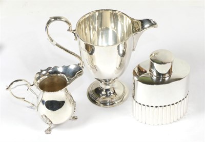 Lot 282 - A George V silver helmet shaped cream-jug, by Richard Comyns, London, 1932; an Elizabeth II...